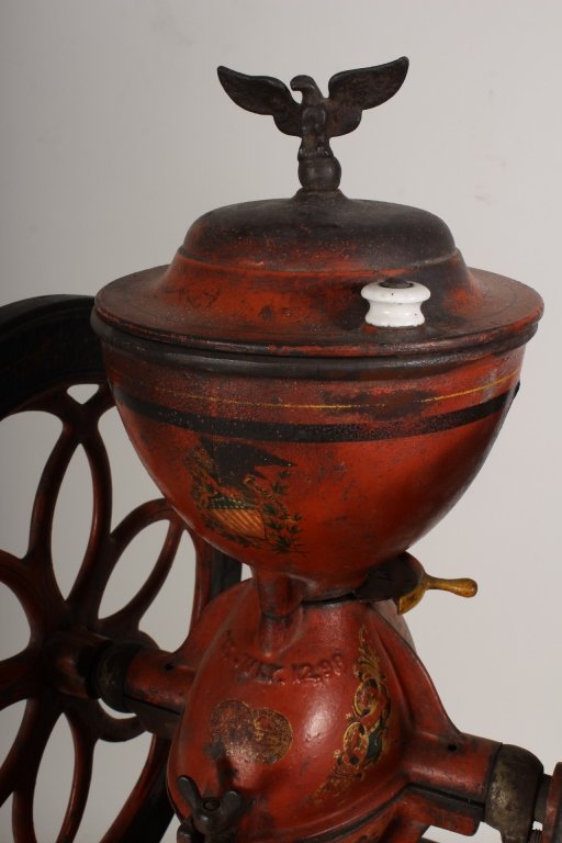 Late 19th c. Coffee Grinder, Philadelphia: Large Red and Blue-painted Cast Iron Coffee Mill, Enterprise Manufacturing Co., Philadelphia, Pennsylvania, late 19th century, central section marked with the patent date "OCT 21 73" and the maker's n