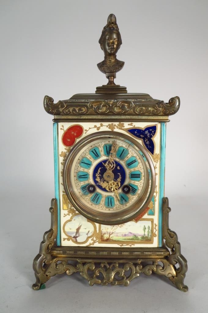 French Enamel Mantel Clock Late 19thc: French Enamel Mantel Clock Late 19thc exquisitely painted with landscape and boating scenes, ormolu figural bust finial and pierced base, strikes on the 1/2 hour and hour.(ALEXC8544) Low Estimate: 300
