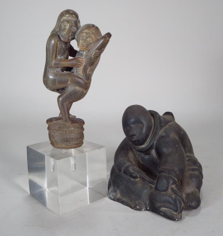 Two Inuit Carvings, NW Coast N. Am., mid 20th C.: Two Innuit carvings, NW Coast, North America, mid 20th C., including a soapstone Fisherman, and a carved horn erotic group. (LUCE8241/2)(LUCE8241/2) Measurements: 4-6 H Condition: Condition commensura