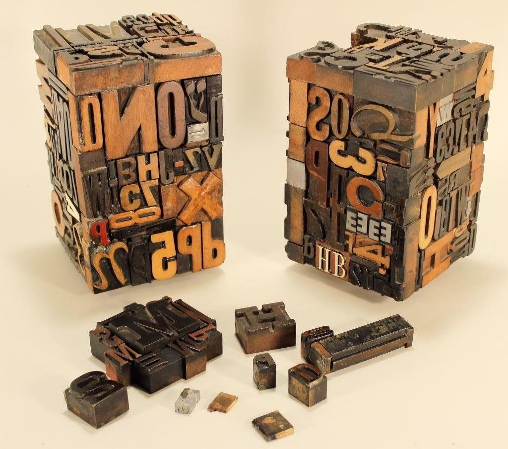 3 Found Art Sculptures of Letterpresses,20th: 3 Found Art Sculptures of Metal and Wood Letterpresses, 20th, base probably signed Norman Keill, dated 72' includes 2 standing cubes, one hanging(SMAI10104/3)(MM) Measurements: 9"H x 5 1/2" Square, 4"