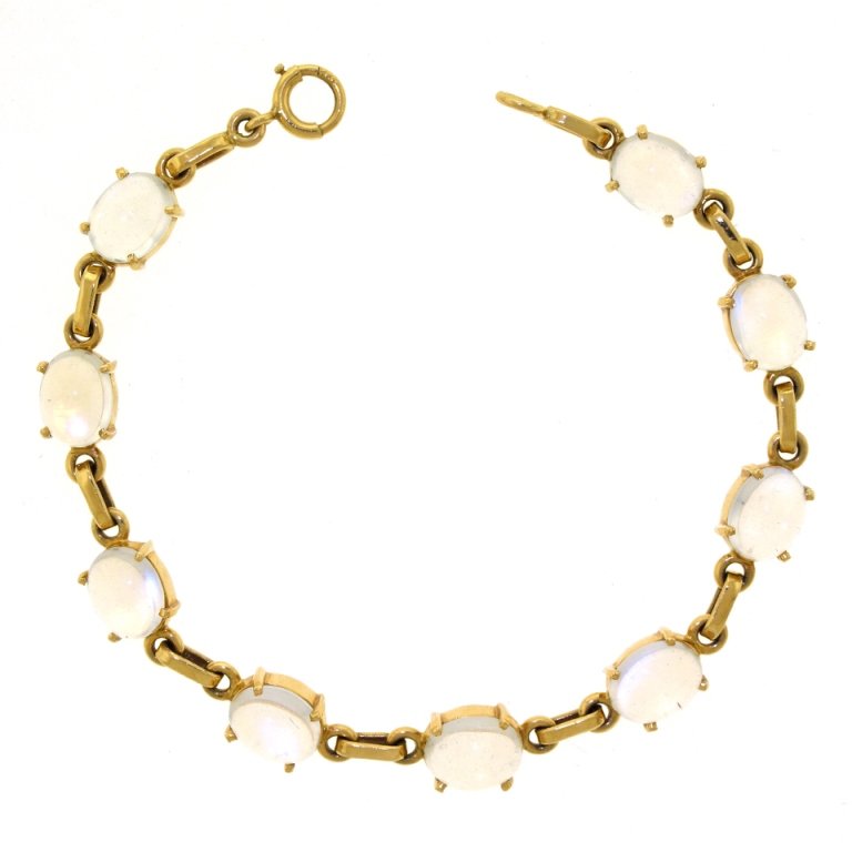 Moonstone Bracelet 14k , Mid century, American: Moonstone Bracelet 14k , Mid century, American. Bracelet set with 16.25 carats total weight moonstones of fine clarity and color. Hallmarked 14k. WEIGHT: 13.2 grams [17526] (BHA10944)(BHA) Measurement