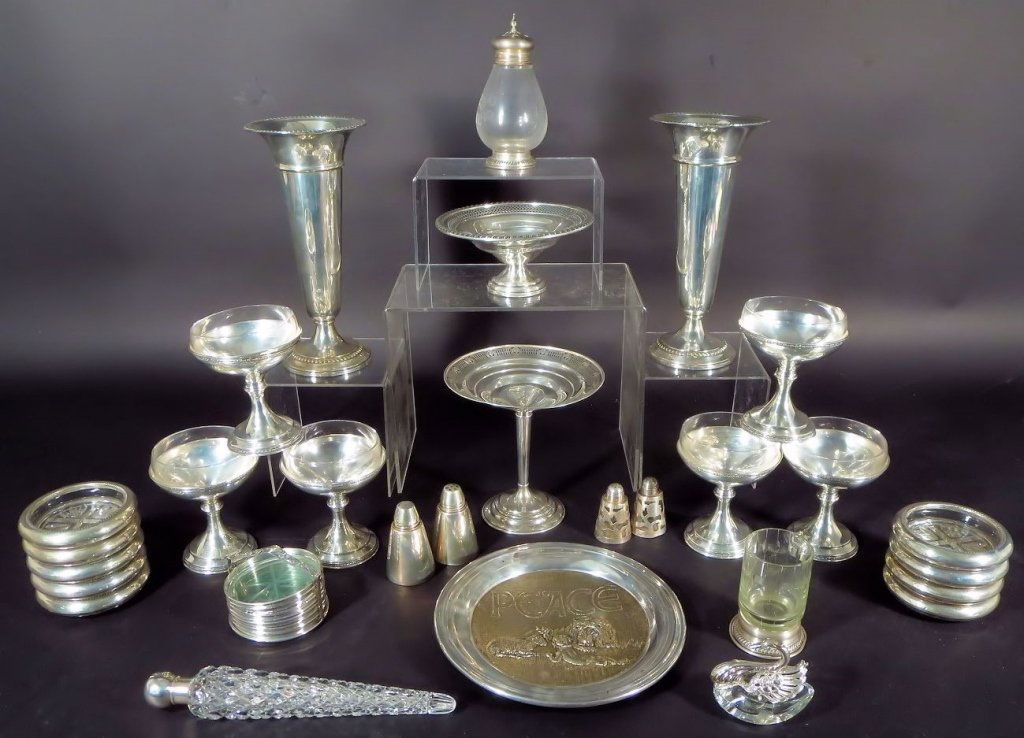 Sterling Silver Lot: Sterling Silver Lot, weighted, glass lined Includes ashtrays, sherbets, trumpet vases, candy dishes, coasters, an English dresser bottle, shakers etc.(GREE10302/LOT)(PR) Measurements: Trumpet Vase 9 1