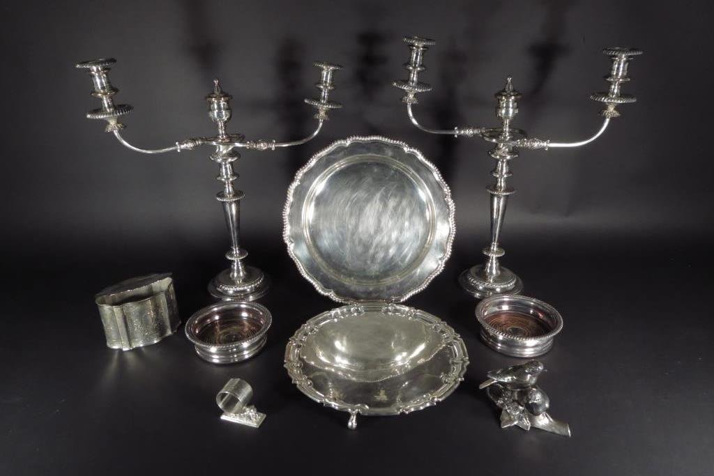 Group of Silverplate Table Articles Am. & English: Group of Silverplate Table Articles American and English 19th/20th Century. Includes a figural Lion napkin ring, 2 wine coasters, a tray, salver, a tea caddy, figural bird slat and pepper and a 2 ligh