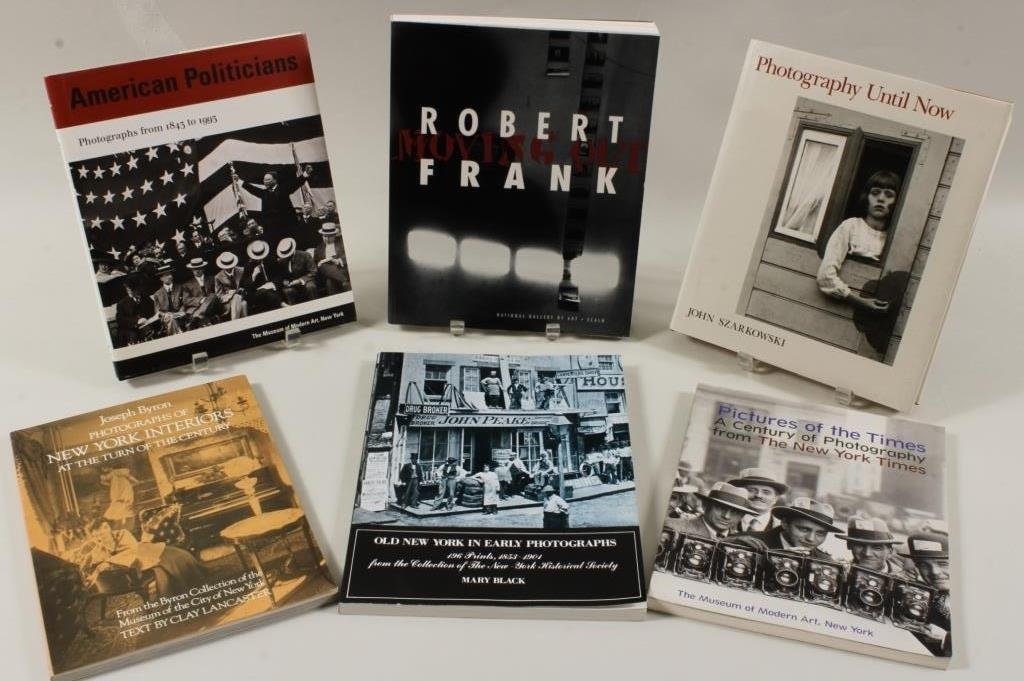 Lot of Photography Books with NYC Emphasis: Lot of Photography Books with NYC Emphasis. Includes a catalogue for Robert Frank exhibition 1994. Titles include "Photographs of New York Interior at the Turn of the Century", "Robert Frank, Moving O