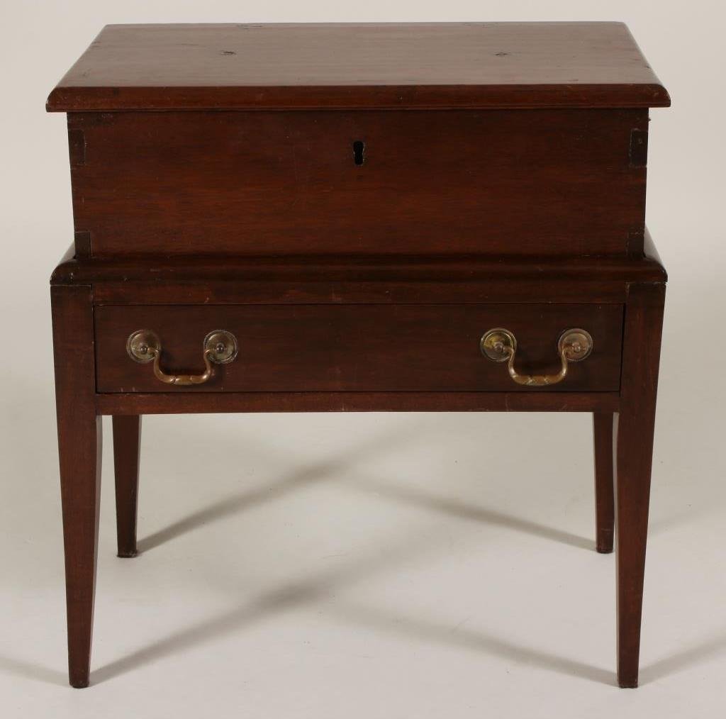 Mahogany Sugar Chest on Stand, 19th C.: Sugar Chest on Stand, 19th C., mahogany with brass hardware, drawer in base; inner top lid has been painted with a symbol at a later date.(SEAB2216) {WK} Measurements: 23 H x 22 W x 14 D Condition: Mo