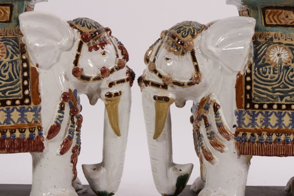 Pair of Chinese Pottery Garden Seats: Pair of Chinese Pottery Garden Seats. Colorful Trappings on a White Elephant.(GERS5500/2)(WT). Measurements: 23" H x 21" L x 10" D