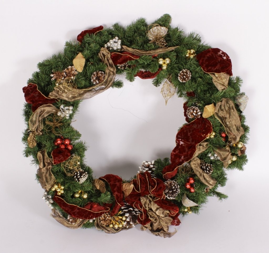 Artificial Christmas Wreath: Artificial Christmas Wreath. decorated with pine cones, red silver and gold balls, red and gold ribbons.(RIVERS4372)(PR) Property Title:From the Estate of Joan Rivers. Measurements: 40" diam.