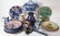 Twenty-Eight Hand-Painted Pottery Vessels