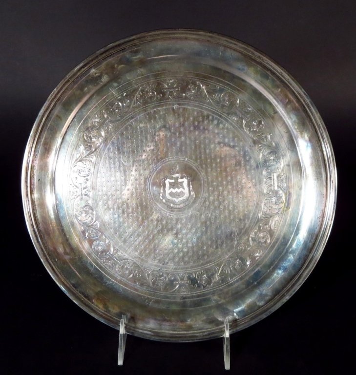 Sterling Tray by S. Kirk & Son, Am., 19th/20th C.: Sterling Tray by S. Kirk & Son, American, 19th/20th C., hand chased with central armorial. Approx Weight: 23.1 ozt(DMAS7315)(PR) Measurements:11" Dia. Property Title:From a Newtown Connecticut Collect