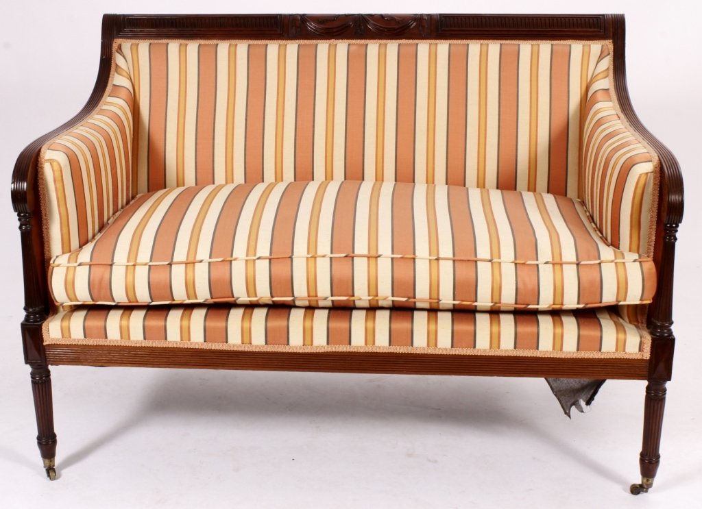 Federal Style Mahogany Carved Settee, 19th-20th: Federal Style Mahogany Carved and Upholstered Settee, L.19th- E. 20th C., ribbon and draped carving centered along crest with fluting, reed carved(DMAS7125)(MM) Measurements:35"H x 48"W x 26"D Propert