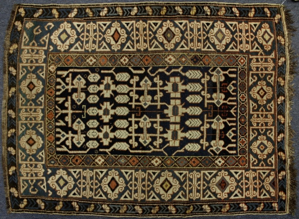 Caucasian Rug, with White Geometric Flowers: Caucasian Rug, blue rectangle with white geometric flowers, green/blue primary border.(DMAS7718)(WT) Measurements:3' 3" x 4' 6" Property Title:From a Newtown Connecticut Collector