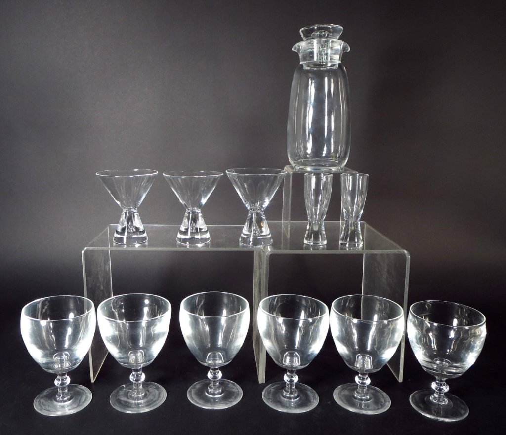 Grp. of 12 Steuben Bar Ware Pieces: Group of 12 Steuben Crystal Bar Ware Pieces, 20th , includes 11 glasses and a pitcher(DMAS7174/12)(MM) Measurements:Varies. Small glasses 4 x 1 1/2, Pitcher 9 x 4 1/2 Property Title:From a Newtown Con