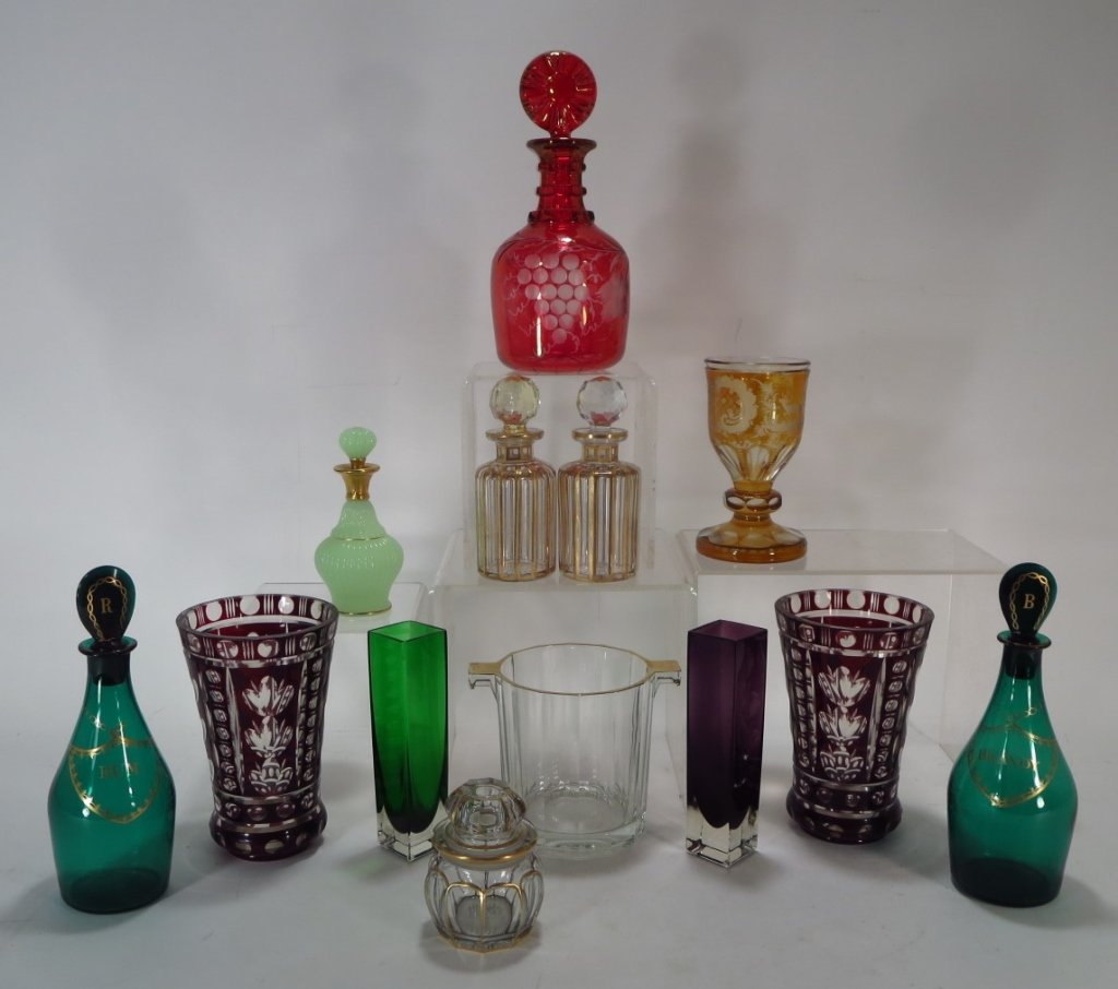 Group of 13 Colored/Clear Pieces,20th: Group of 13 Colored/,Clear and Gold paint decorated Pieces,20th C., includes 5 vases, 3 decanters, 4 small lidded bottles, ice bucket(DMAS7167/13)(MM) Measurements:Varies. Small lidded jar 4 1/2" x 3 