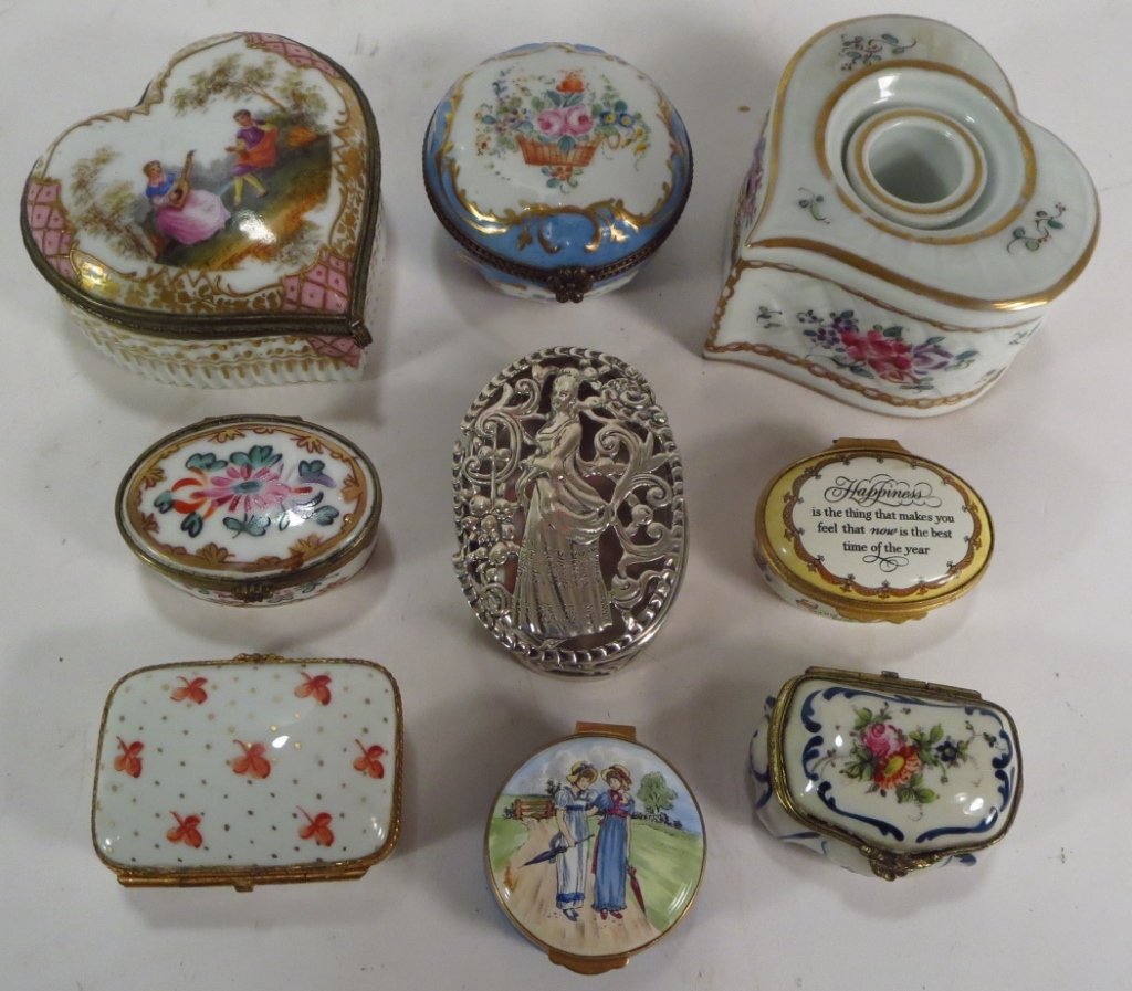 Porcelain and Enamel Boxes & Porcelain Inkwell: Miscellaneous Group of Porcelain and Enamel Boxes, including several Limoges and a Meissen heart-shaped box, plus a hear-form Paris Porcelain inkwell and a silver plate box.(CLAR7211/9)(WK) Measuremen
