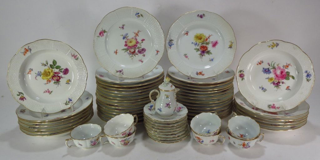 Group of Meissen Plates with Handpainted Florals: Meissen porcelain plates c., 1876-1925, with hand-painted floral bouquets with basketweave borders and gilt rims, all with blue crossed swords marks under glaze; including 30 dinner plates, 12 soup pl