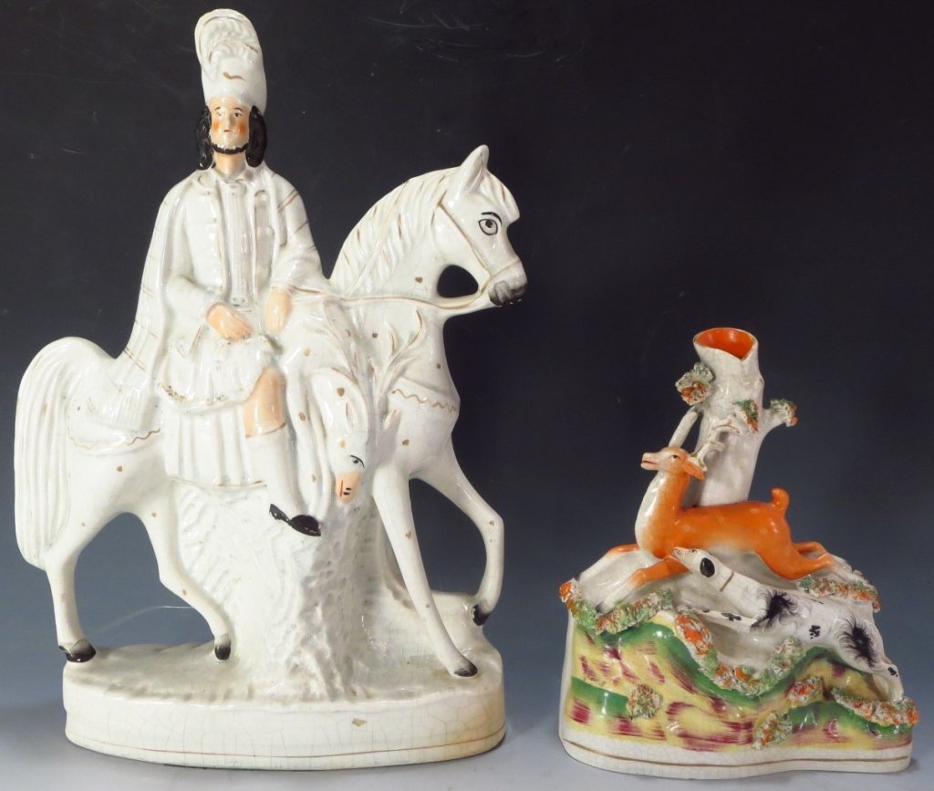 Lot of Two Staffordshire Figurines English 19th C.: Lot of Two Staffordshire Figurines English 19th C. Deer w/ Dog and Man on Horse.(DTHO7410/2)(AC) Measurements:9" x 7" and 15" x 11" Property Title: