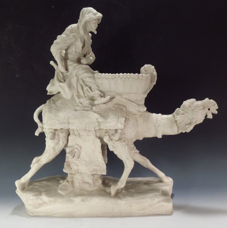 Amphora Parian Ware Camel & Arab Rider C. 1900: Amphora Parian Ware Group Camel & Arab Rider C. 1900, impressed marks: Austria, Crown, Amphora.(DREU7401)(AC) Measurements:24" x 25" Property Title: