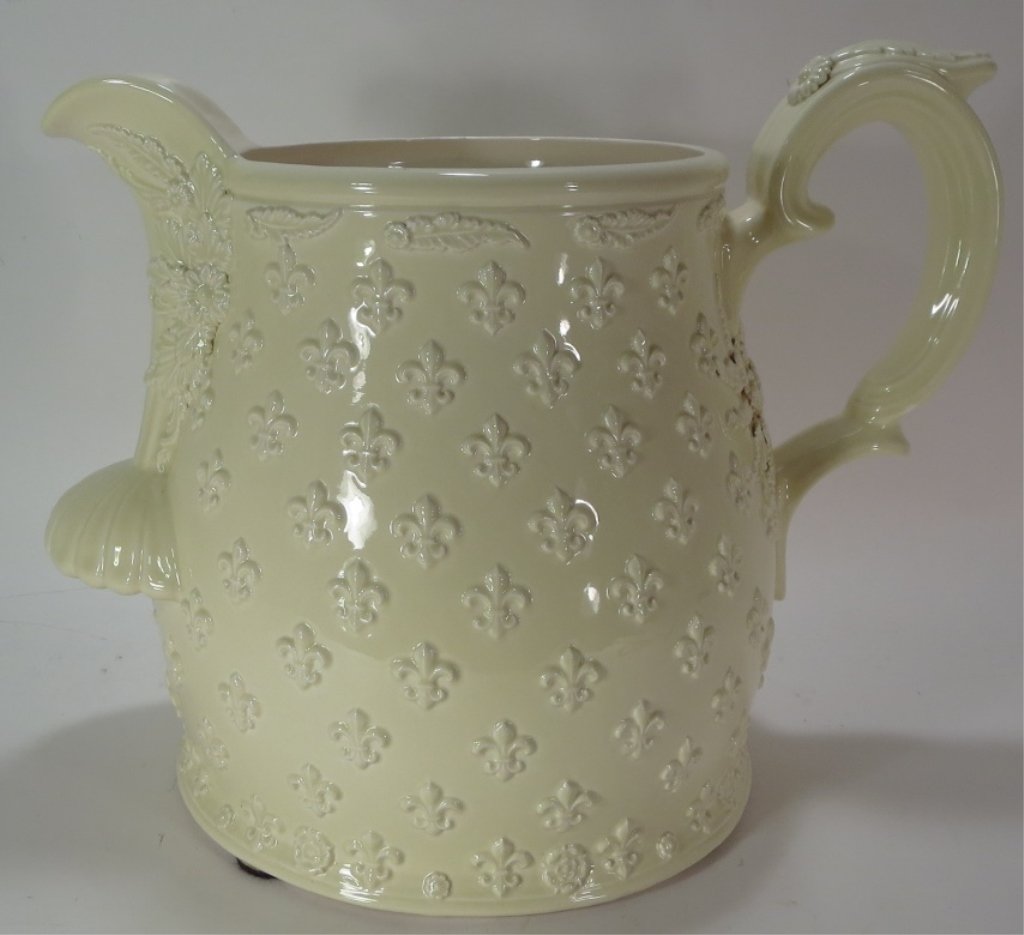 Monumental Fleur delis Decorated Creamware Pitcher: Monumental Fleur de lis Patterned Ceramic Creamware Pitcher, 20th, floral and leaf details(LHED7024)(MM) Measurements:18"H x 25"W Property Title:From a Washington Connecticut Estate
