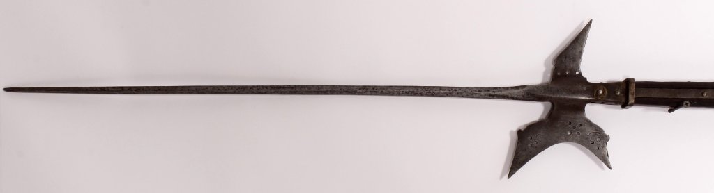Medieval Halberd, Probably Swiss, 16th/17th C.: Medieval Halberd, Probably Swiss, 16th/17th C., spike halberd with pierced crescent blade and crowbeak spike to the rear. Blade engraved with crescent moons and rosette [AN0001](WSIM7300)(PR) Measurem