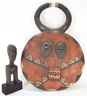 Baule Animal Mask, and a Bamana Door Latch: Baule, Ivory Coast, carved and painted wood mask, the circular stylized animal head form with pierced eyes, rectangular mouth with sharpened teeth, horns; red, white, and black pigments; together