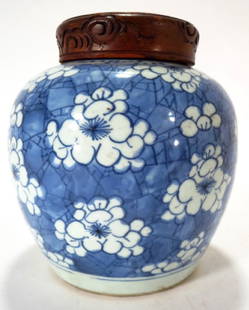 Chinese Blue & White Pottery Ginger Jar, 19th C.: Chinese Blue & White Pottery Ginger Jar, 19th C., with Carved Wood Lid, allover white flowers on blue ground with line design (JGAR7838){TBK} Property from a Private Estate in Chevy Chase, MD. The col