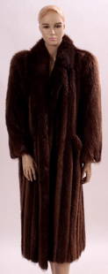 Long Brown Fur Coat: Long fur (possibly Nurtia) brown coat by Larry Weinstein - NY. Small collar, hook & eye closure, straight sleeves and front slip pockets. (GILL8801){KR} Measurements: Size large.