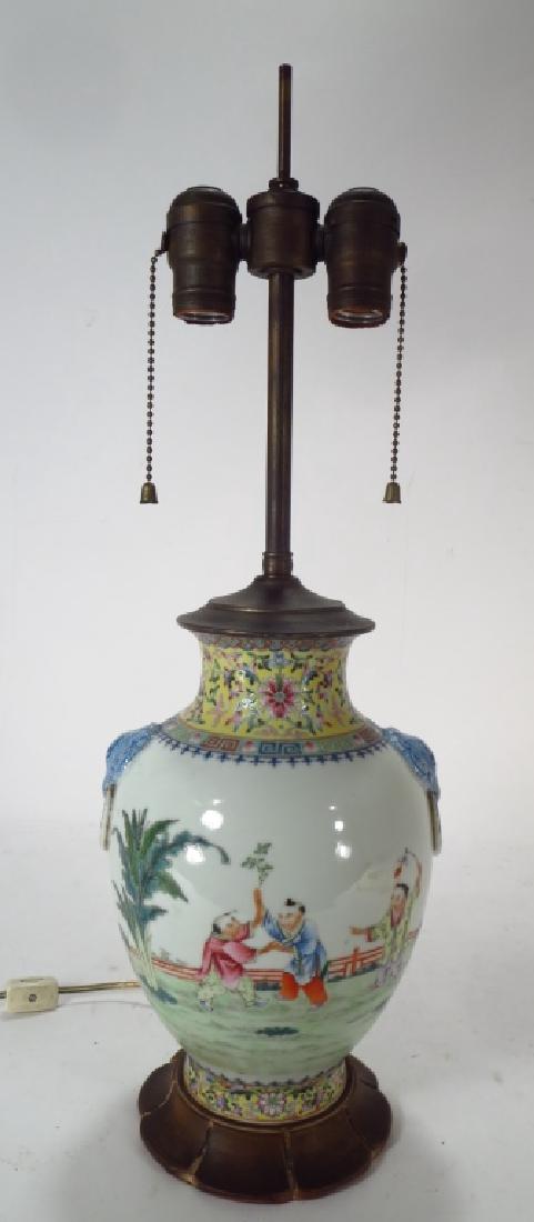 Chinese Porcelain Vase as Lamp, elephant handle: Chinese Porcelain Vase as Lamp, elephant and ring handles, with hand painted scene of man bearing fish to beauties (DMAS7808) {MM} Property Title:From a Newtown Connecticut Collector Measurements:10 x