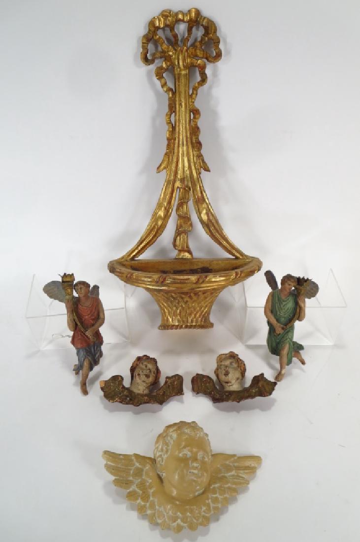Carved wooden putti etc.: Carved wooden putti etc. Includes 2 carved wooden putti, a cast putto, 2 composite angels and a carved giltwood basket form sconce. (AMYG1368/6) {PR} Property Title: Measurements:Giltwood sconce 23"