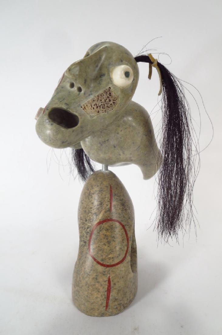 F. Kuptana, Inuit Sculpture of a Shaman: Floyd Kuptana, Inuit, b. 1964, Shaman, stone sculpture with bone and horse hair. (W621220) {WK} Property Title: Measurements:14.75 H x 12 L x 7 W