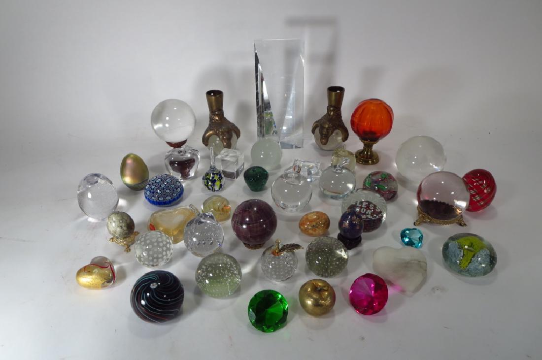 Lot of Paperweights, Stone Eggs etc.: Lot of Paperweights, Stone Eggs etc. Various designs and materials, some with stands, most unsigned. (AMYG1365/lot) {PR} Property Title: Measurements:Various