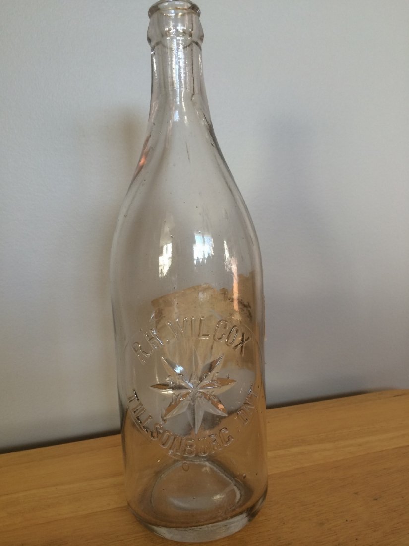 Wilcox Soda Bottle: R.H.Wilcox Tillsonburg quart soda bottle with Chabot paper label affixed au verso.