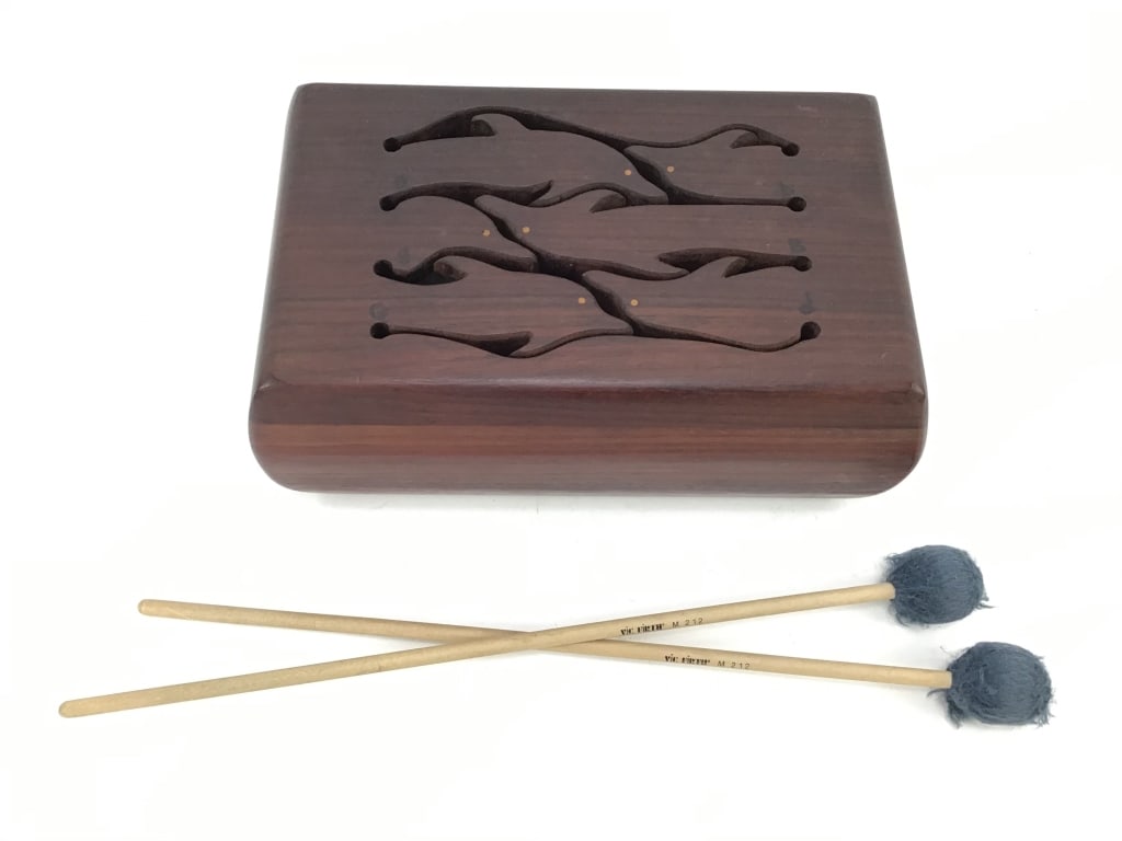 Vintage 6 note Tongue drum with Dolphin motif: Vintage 6 note Tongue drum with Dolphin motif