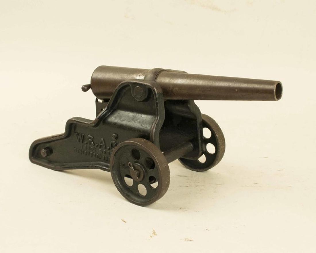 Winchester Signal Cannon: A very nice Winchester Repeating Firearms Co. signal gun, 12 gauge, breech-loading, all iron and steel, on its wheeled carriage. Bore is very good, and overall condition i very good plus, retaining m