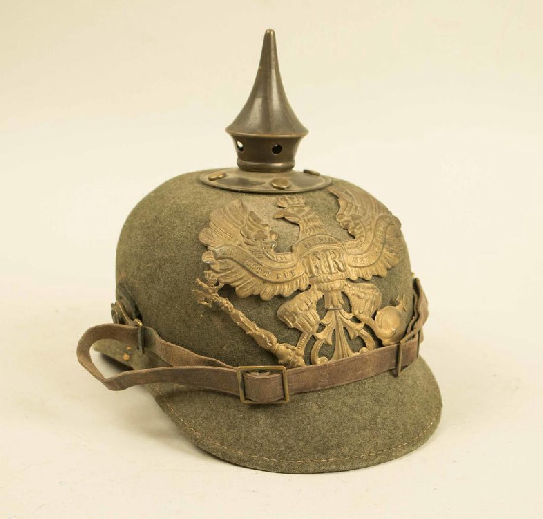 Prussian Felt Bodied "ersatz" Spiked Helmet, with: A very nice Imperial German Prussian Enlisted man's "ersatz" spiked helmet, the body being made of green compressed felt, with tombac brass mounts, leather chinstrap and liner, but missing the cockad