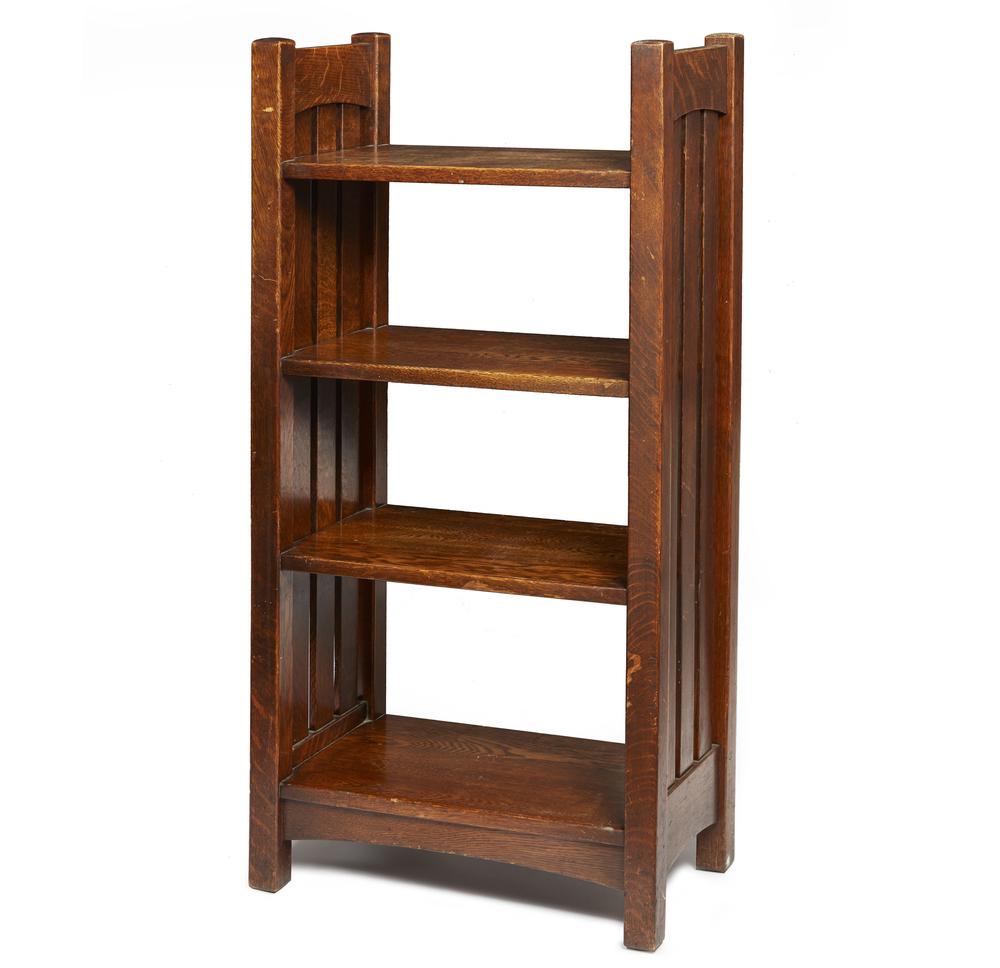 L. and J.G. Stickley Magazine Stand, #46: L & J.G. Stickley oak magazine stand #46 having four shelves. Bears decal under upper shelf, "The Work of L & J.G. Stickley". Dimensions: 41.75"h x 21"w x 12"d. For shipping quote, please contact Box 