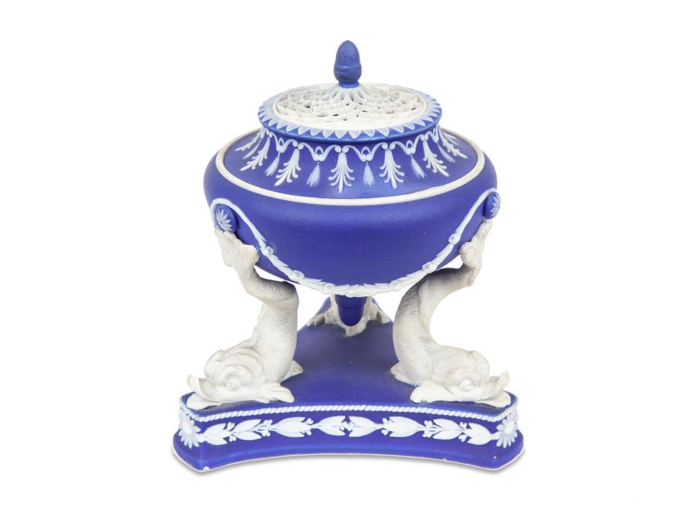Wedgwood Dark Blue Pastille Burner (Dolphin): Wedgwood dark blue pastille burner supported by three dolphins on a rounded triangular base. Impressed on underside, "WEDGWOOD / V". Dimensions: (overall) 5.25"h. 19th century. Processing and shipping