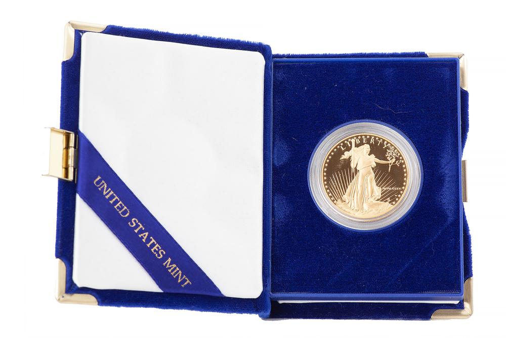 1 oz $50 Gold American Eagle Coin, 1986: Cased 1986 one ounce fifty dollar gold American Eagle coin. Mint: West Point. Processing and shipping within the continental U.S. $25.00 plus 1.5% replacement cost insurance.