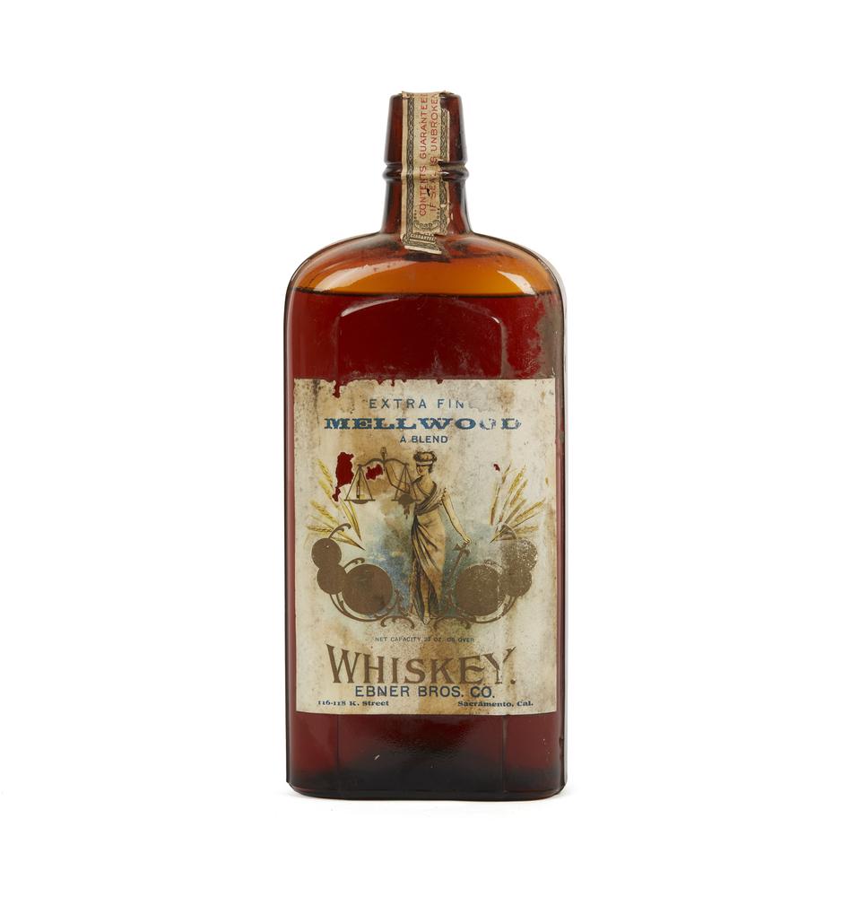 Unopened Ebner Bros.Co., Sacramento, Mellwood Whiskey: Unopened bottle of Mellwood extra fine Whiskey, Ebner Bros. Co., Sacramento, Cal. Dimensions: 10.37"h. Processing and shipping within the continental U.S. $32.00 plus 1.5% replacement cost insurance.