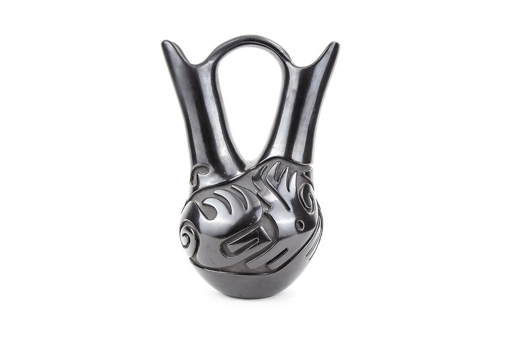 Santa Clara Pueblo Wedding Vase, Teresita Naranjo: Santa Clara Pueblo wedding vase by Teresita Naranjo (1919-1999). Decorated with incised avanyu (water serpent). Signed on underside. Teresita Naranjo is the daughter of Christina Naranjo, and sister o