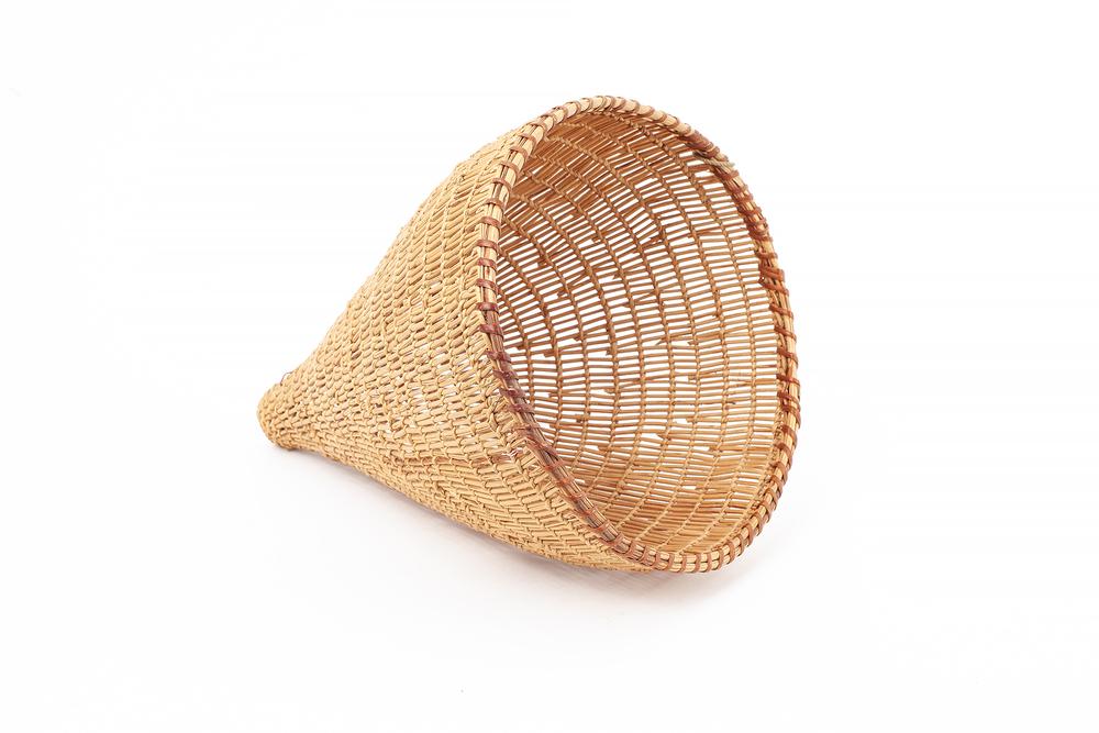 Washoe Miniature Open Twined Burden Basket: Washoe miniature open twined burden basket of conical shape and constructed of very thin willow shoots. Bears two tags: 1) "Amy / Margaret Cohn Collection, Sleese Bryant Washoe Lake Tahoe Area 1907"; 