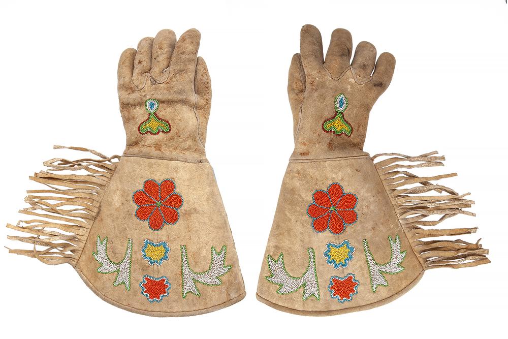 Native American Beaded Gauntlet Gloves: Native American beaded gauntlet gloves with side fringe. Dimensions: 15"l. Provenance: Estate of Richard Radcliffe, Murray, Utah. Processing and shipping within the continental U.S. $40.00 plus 1.5% r