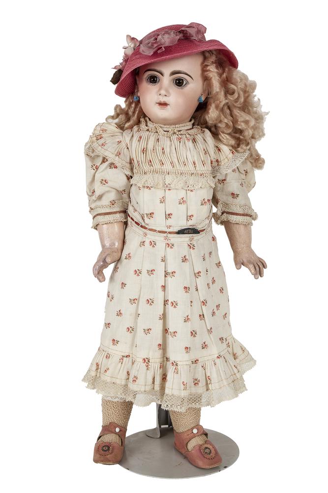 Jumeau French Doll: Jumeau Tete French doll. Marked on lower back, "Jumeau / Medaille D'Or / Paris". Creamy bisque. Composition body, arms and legs. All original. Dimensions: 26.5"h.Ê Processing and shipping within the 