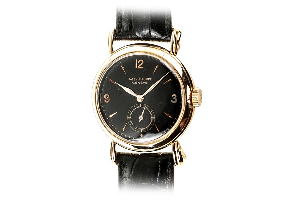 Patek Philippe 18k Rose Gold Wristwatch: Patek Philippe 18k rose gold wristwatch. Signed case, movement, dial. Ref. #2453. Case serial #671,904. Movement serial #740,009. 33mm. Circa 1950s. Processing and shipping within the continental U.S.