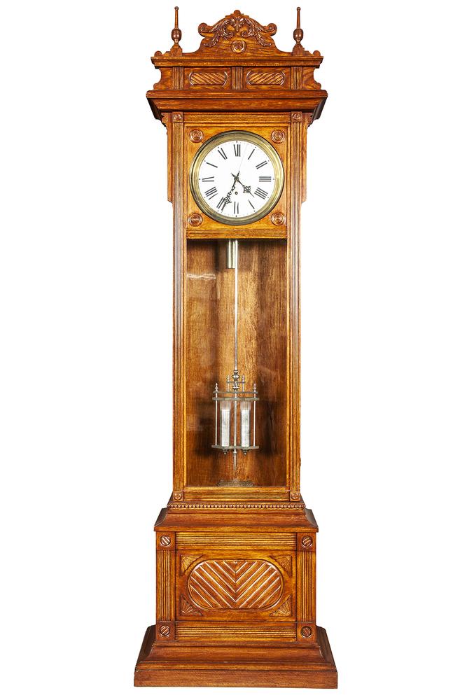 Waterbury Floor Regulator No.61: Waterbury floor regulator No. 61. Roman numeral dial, sweep second hand and brass bezel. Brass plate interior, "Waterbury Clock Co." Oak case. Dimensions: 98.5"h x 28.5"w x 13.5"d For shipping quote: 