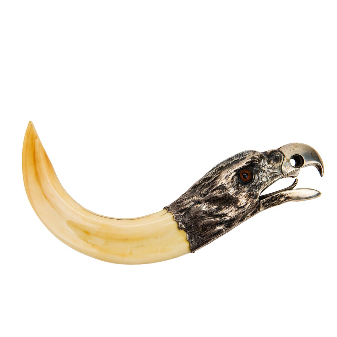 Sterling Silver and Boar Tusk Eagle-Form Cigar Cutter, 19th Century: An impressive figural cigar cutter fashioned from a natural boar tusk with a sterling silver eagle's head mount. The finely detailed silver casting depicts a fierce American eagle with textured plumag