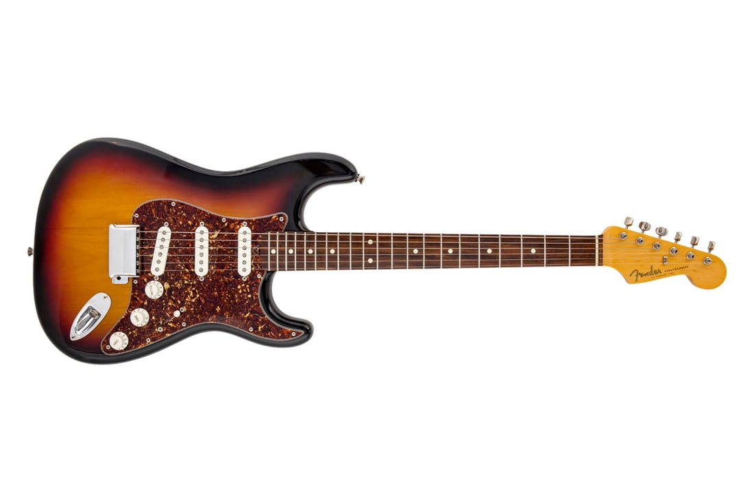 2005 Fender John Mayer Artist Stratocaster Electric Guitar: A 2005 Fender John Mayer Artist Stratocaster signature model electric guitar in sunburst finish with rosewood fretboard. Serial number SE01735. Comes with the original John Mayer signature guitar case