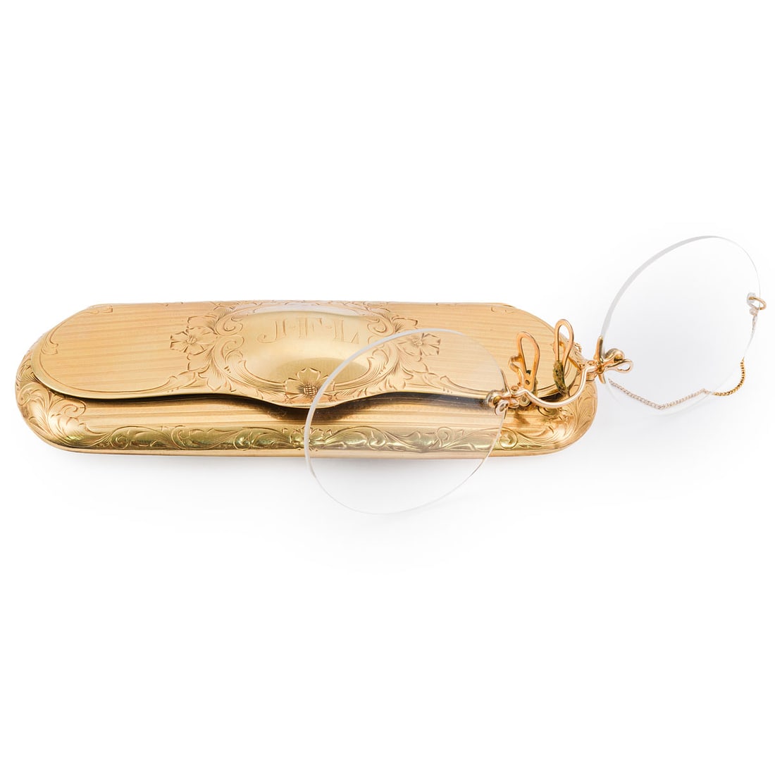 14K Yellow Gold Spectacle Case with Spectacles: Rectangular 14K yellow gold spectacle case with engine-turned and floral-engraved decoration, the lid centered by a cartouche monogrammed "JFL." The interior lined in green velvet and housing a pair o