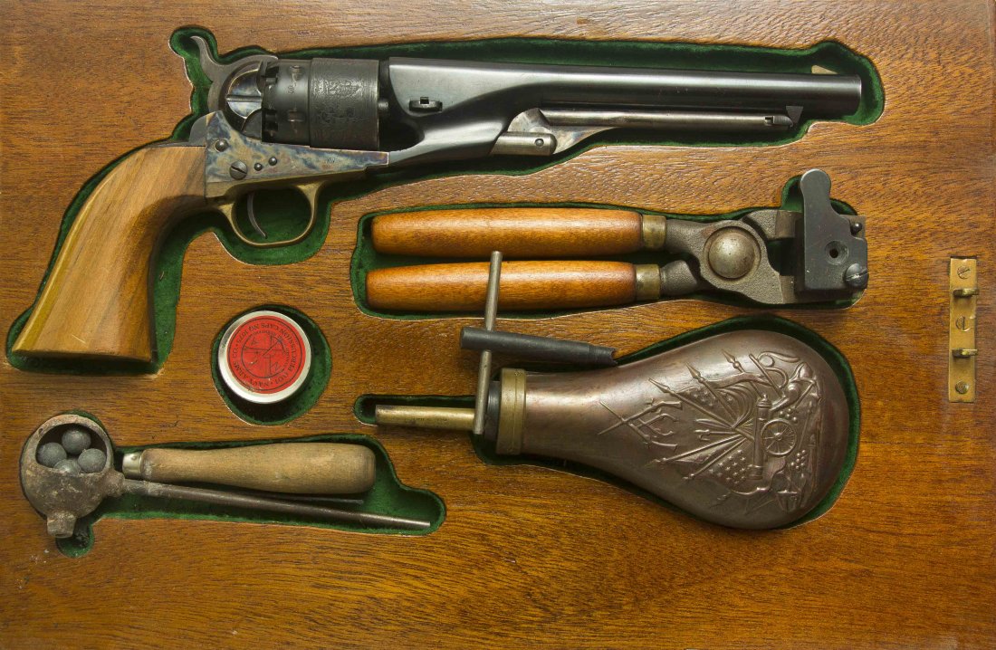 Cased Blackpowder Replica Model 1860 Colt Army Revolver: With flask and tools. Beautiful case-hardened frame. Made in Italy. Serial No. A 3946. Please note we do not accept credit cards. Processing and shipping within the continental U.S. $40.00 plus 1.5% r