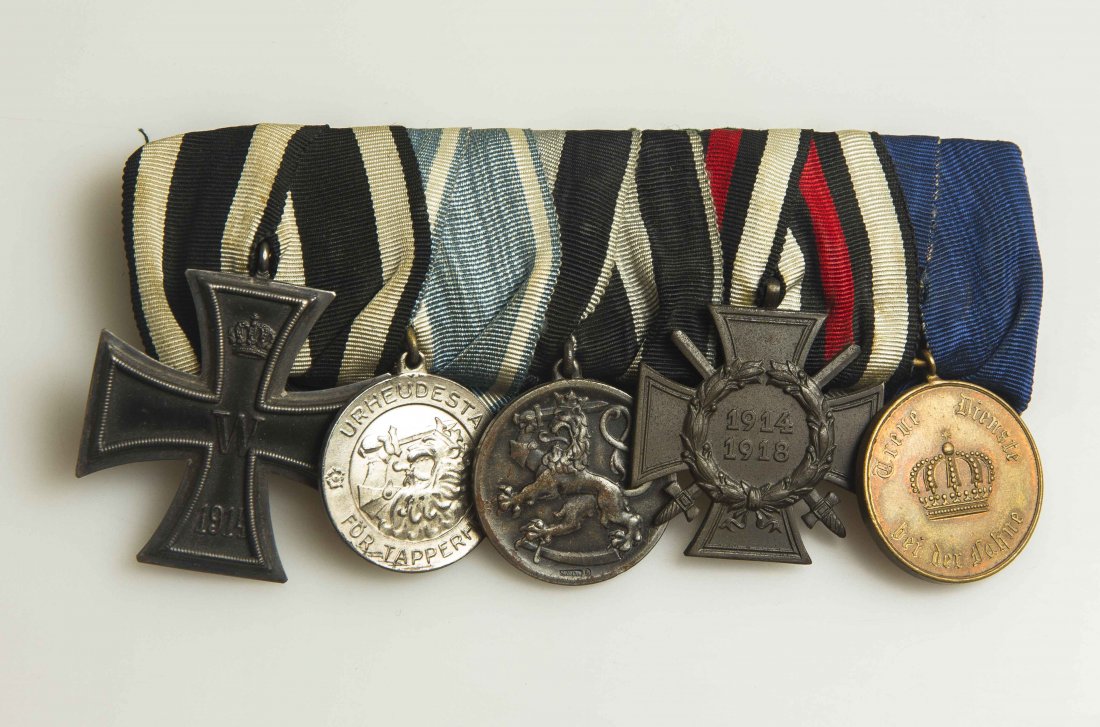 5 Imperial German and Finnish Medals: Lot including 1. Iron Cross 2nd class, Finnish Tapperhat 1918 medal, Finnish silver 1918 war merit medal, Weima Honor Cross with swords, Prussian 12 year service medal. Please note we do not accept cr
