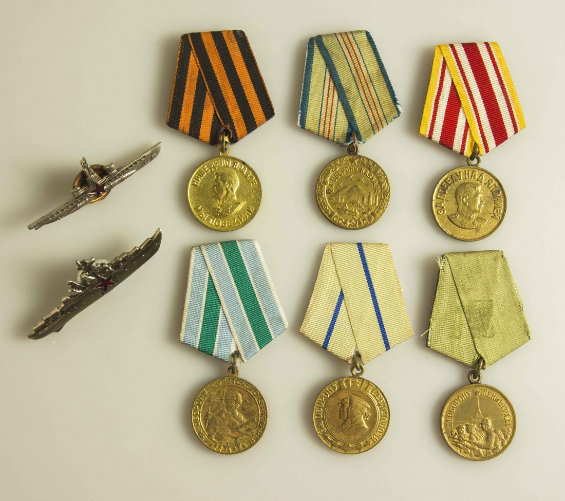 Soviet Russian Medals and Badges: Soviet Submariner’s Badge; Soviet Navy Surface Warfare Badge; Victory Over Japan Medal; Victory over Germany medal; Defence of Leningrad Medal; Defense of Sebastopol Medal; Defense of Caucasus Medal